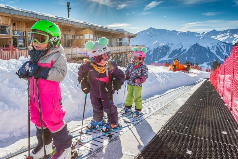 Esquiar com crianças na Suíça - Xtravel
