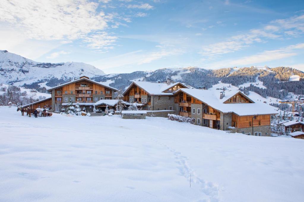 Hotel nas montanhas francesas com neve - Xtravel